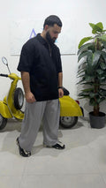 POLO CON ZIP NERA